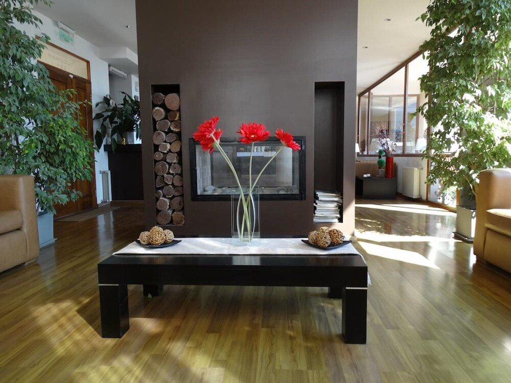 Sala de estar com sofás do View Hotel BRC